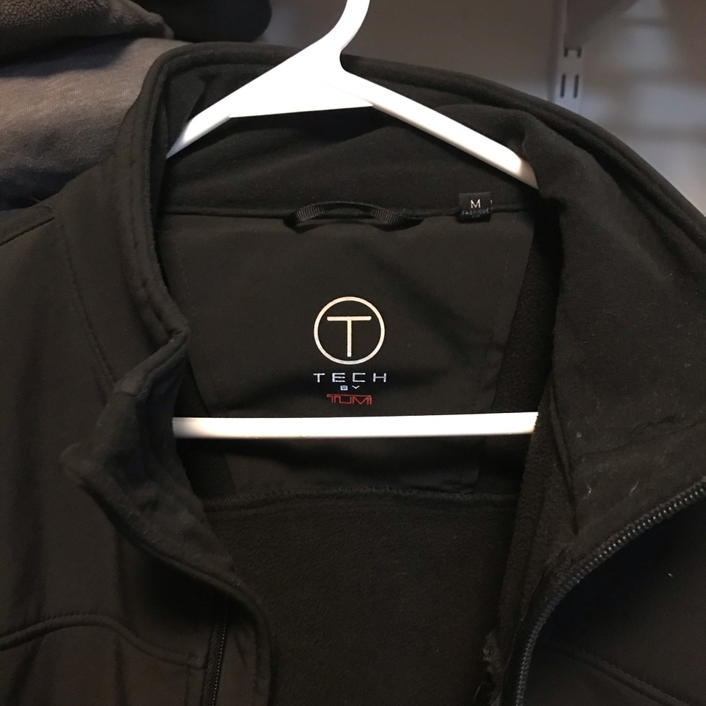 Lightly used Tumi jacket for men’s black